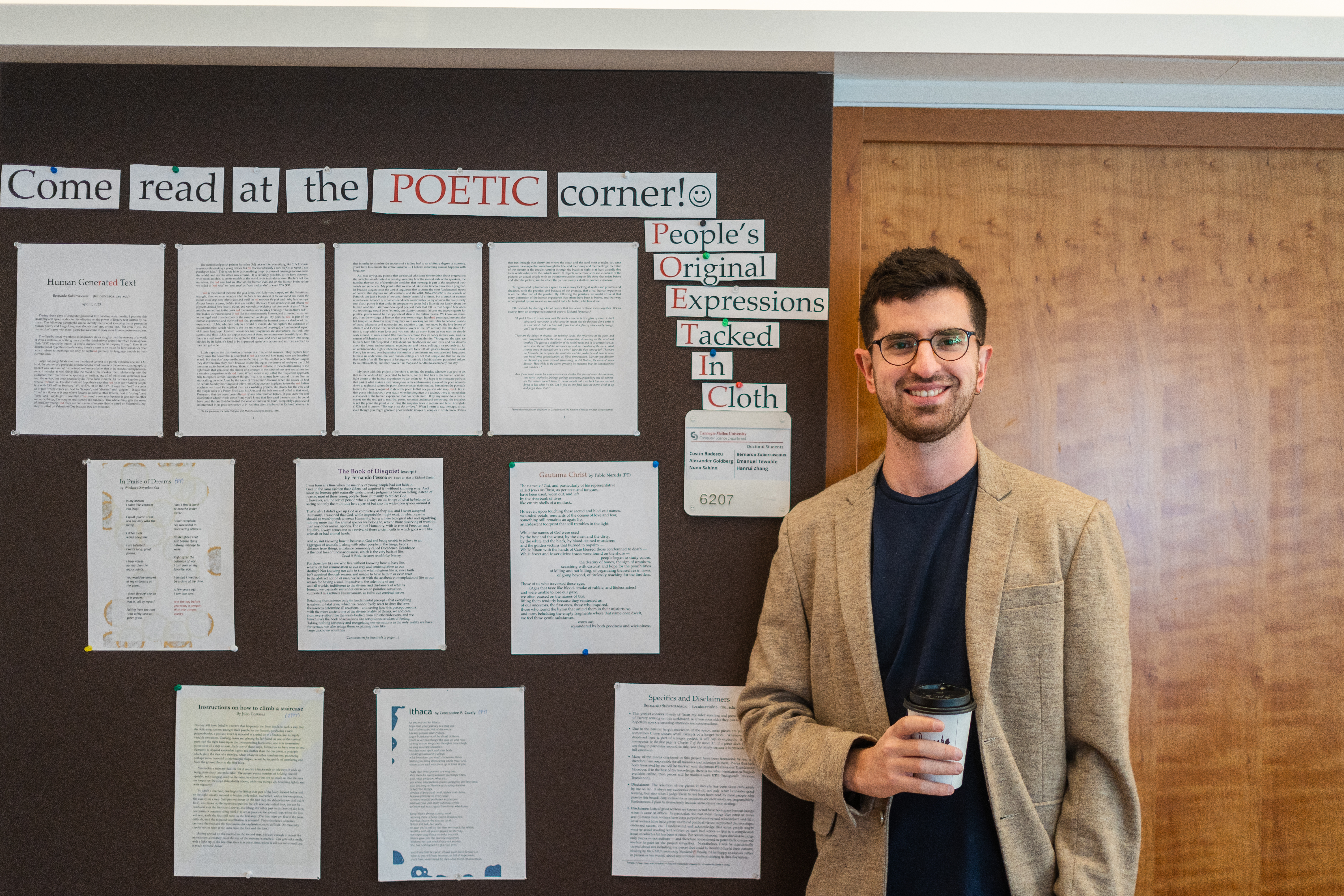 Picture of me in front of the cloth board of the POETIC project